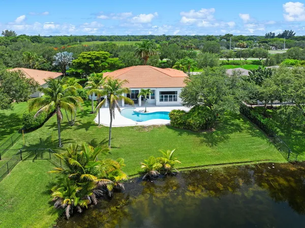a view of a garden with a lake