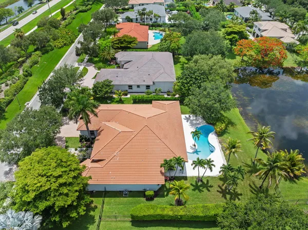 an aerial view of a house with a garden
