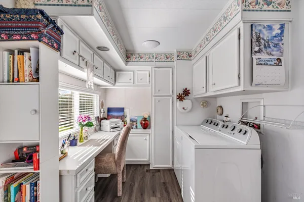 a storage room with washer and dryer