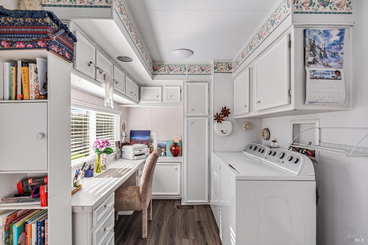 192 Mosshill Court Santa Rosa, CA 95409 - Photo 22 of 31 a storage room with washer and dryer