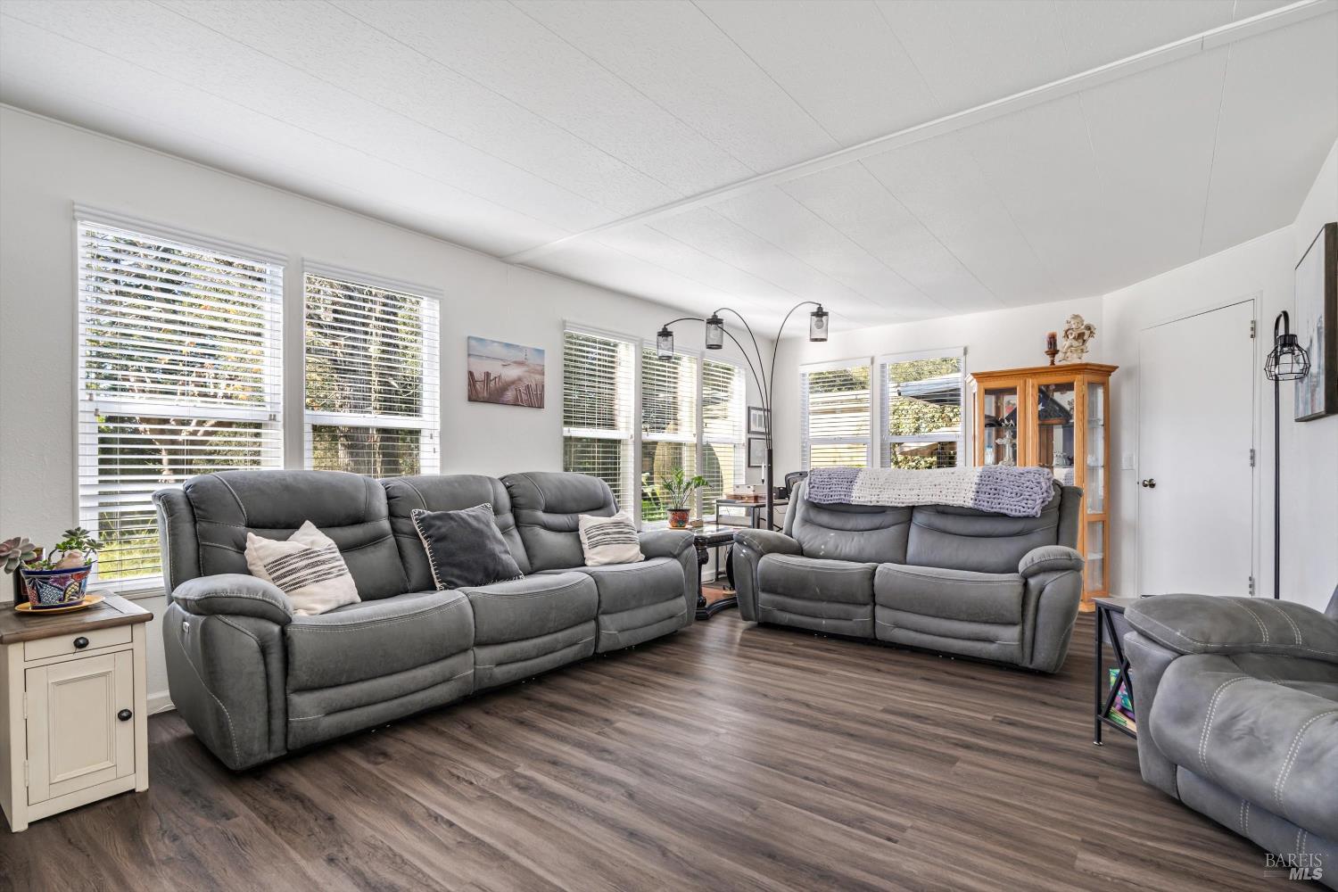 192 Mosshill Court Santa Rosa, CA 95409 - Photo 5 of 31 a living room with furniture and a large window