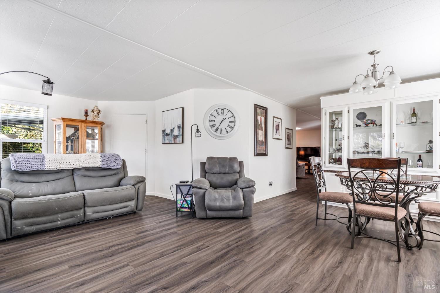 192 Mosshill Court Santa Rosa, CA 95409 - Photo 9 of 31 a living room with furniture and wooden floor