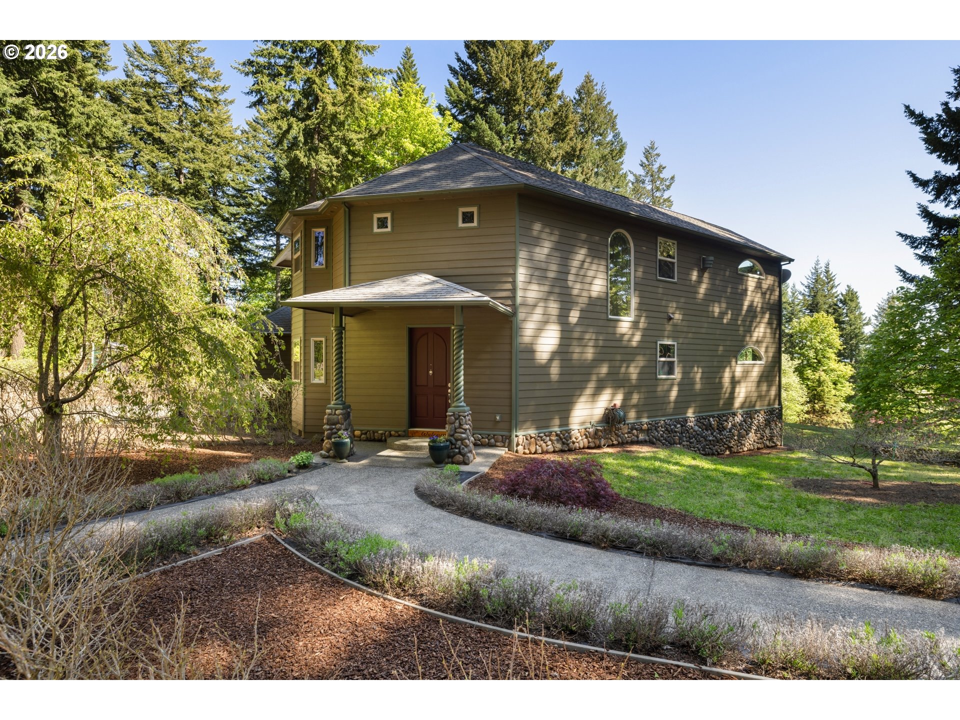 9491 Cook-Underwood Road Underwood, WA 98651 - Photo 11 of 46 a front view of a house with a yard