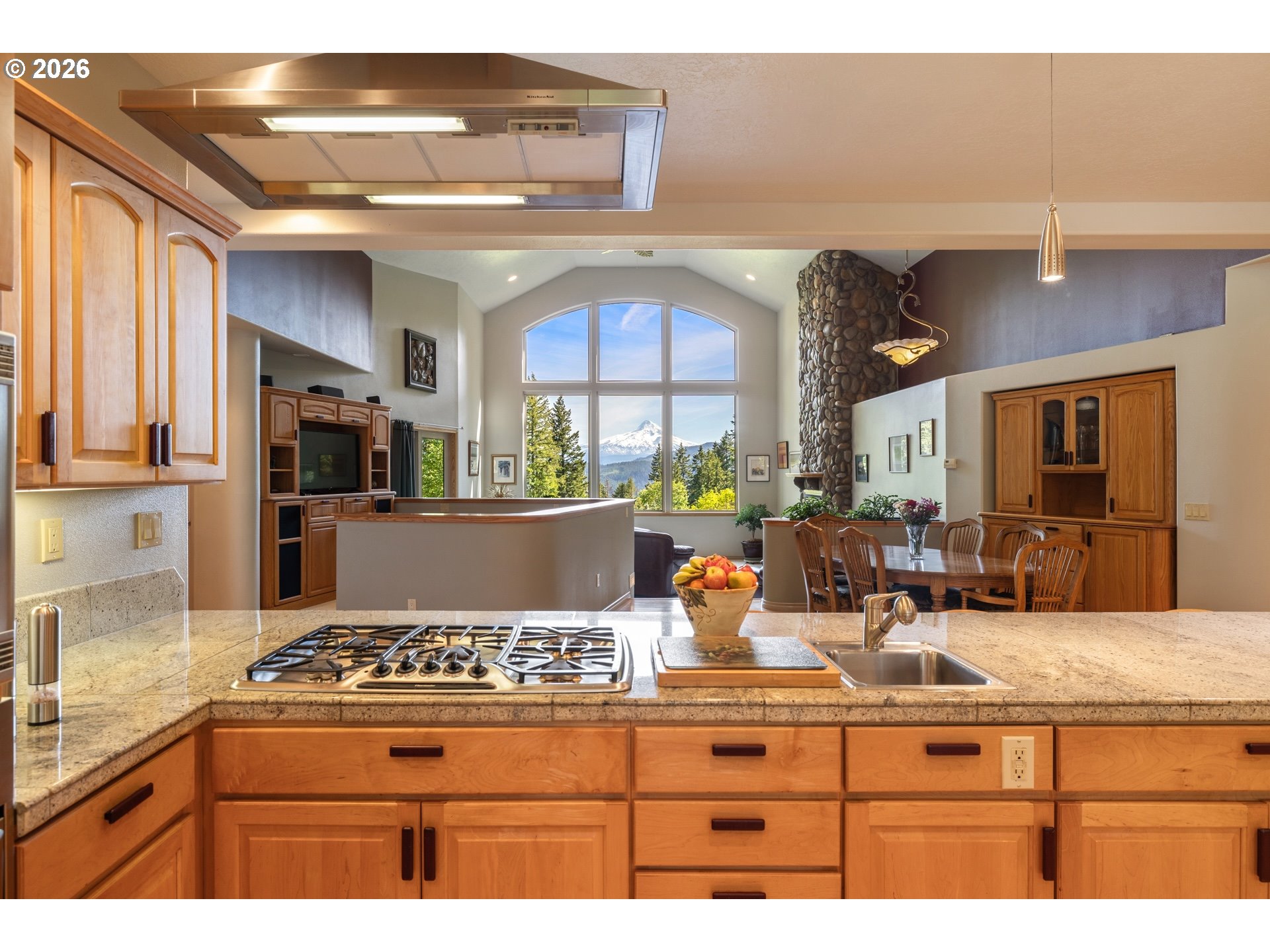 9491 Cook-Underwood Road Underwood, WA 98651 - Photo 15 of 46 a kitchen with stainless steel appliances granite countertop a stove a sink and a microwave