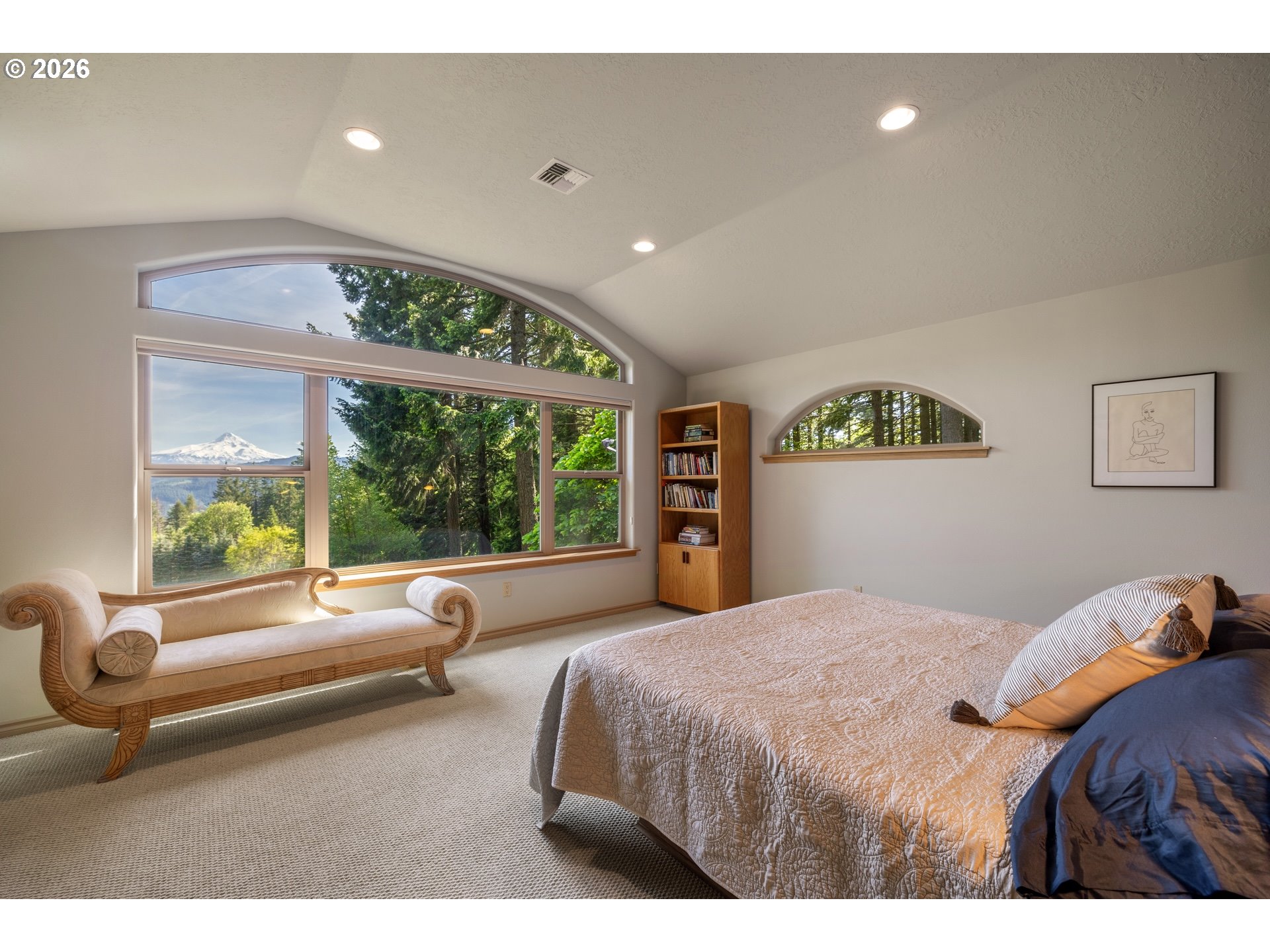 9491 Cook-Underwood Road Underwood, WA 98651 - Photo 28 of 46 a bedroom with a bed and a large window