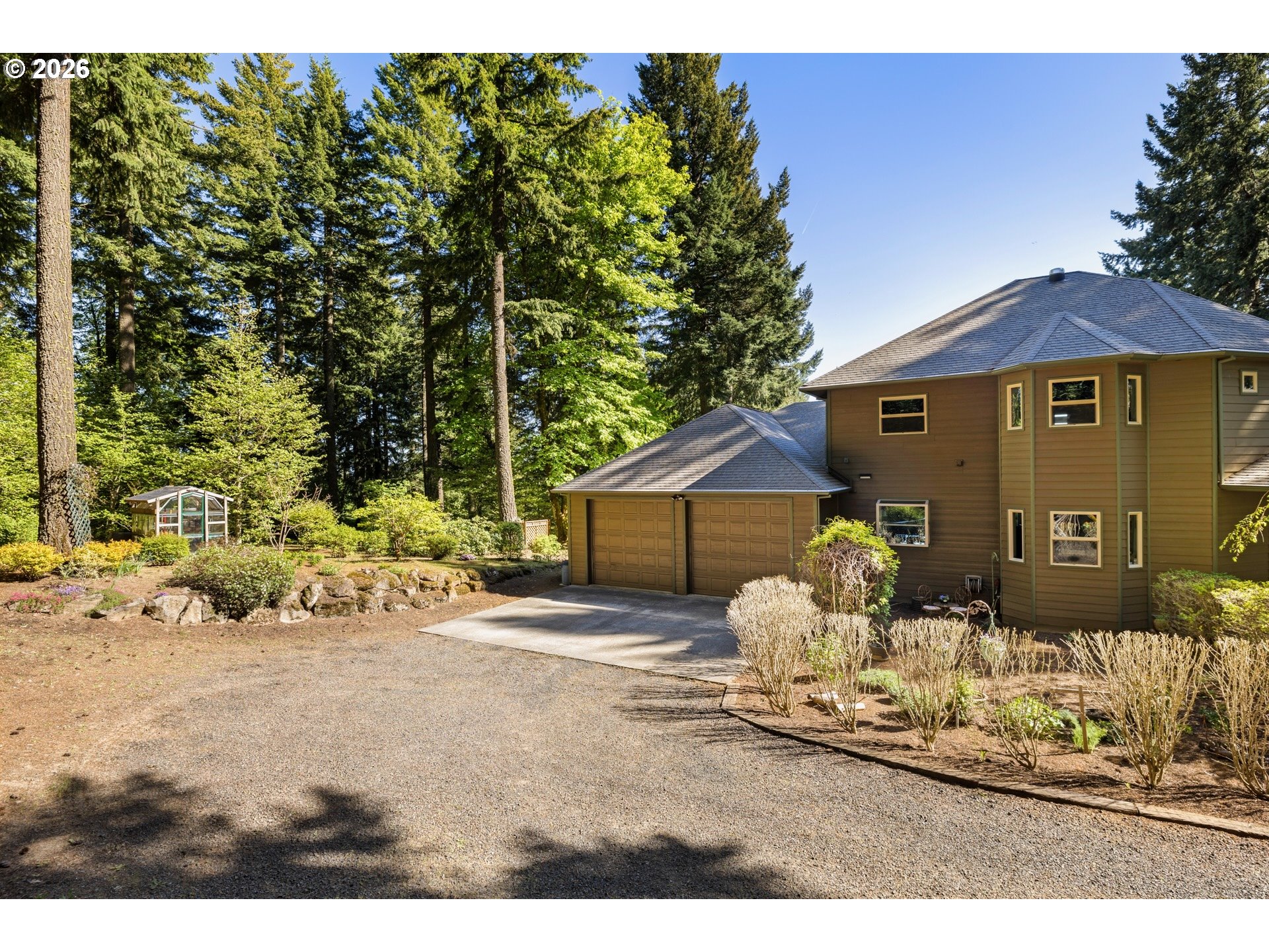 9491 Cook-Underwood Road Underwood, WA 98651 - Photo 6 of 46 a front view of a house with a yard
