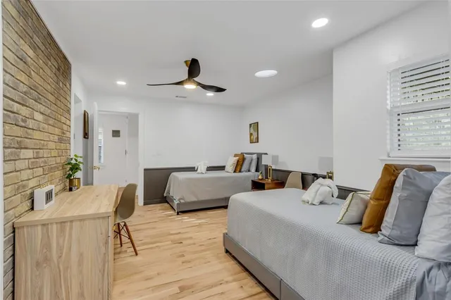 a bedroom with a bed and furniture