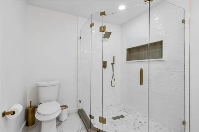 a view of a backyard with swimming pool