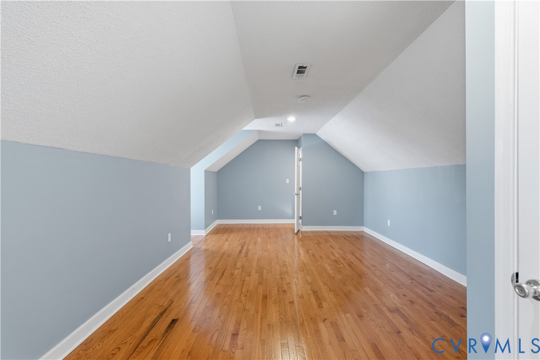 2809 Brampton Way North Chesterfield, VA 23234 - Photo 16 of 38 a view of an empty room with wooden floor