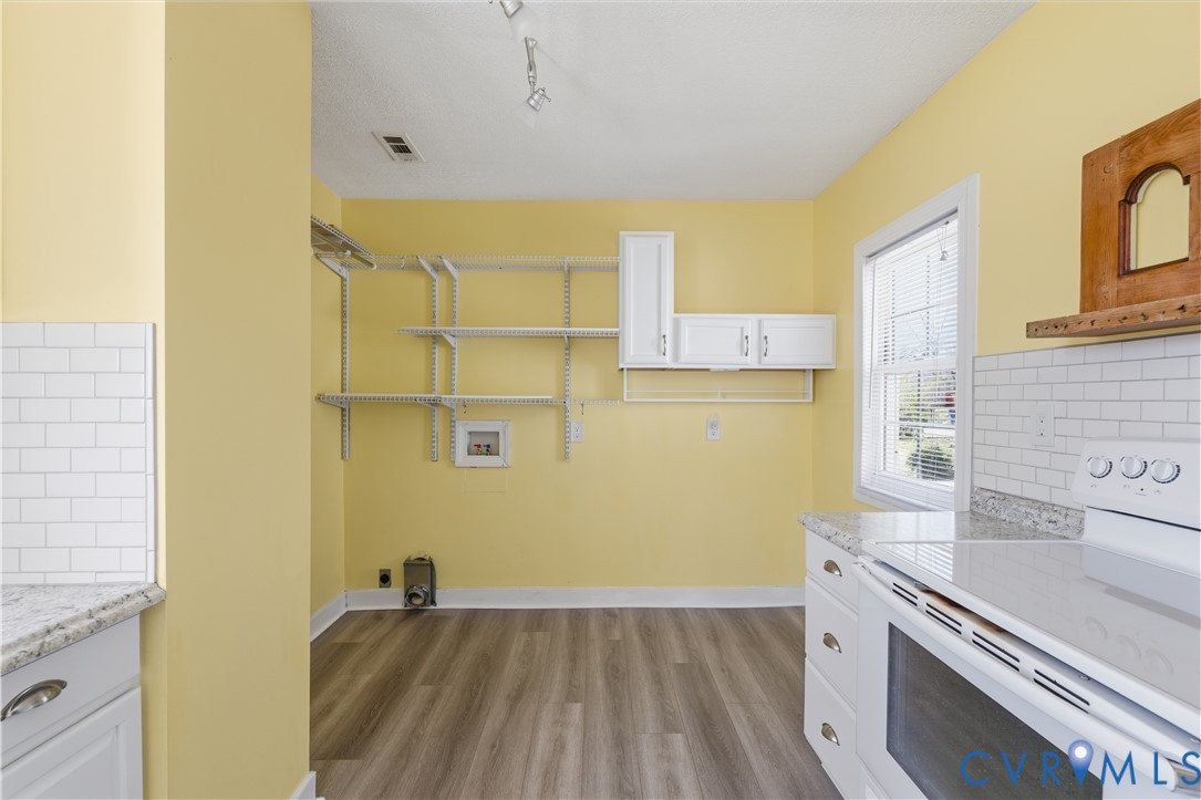 2809 Brampton Way North Chesterfield, VA 23234 - Photo 6 of 38 a view of a kitchen with a sink and dishwasher