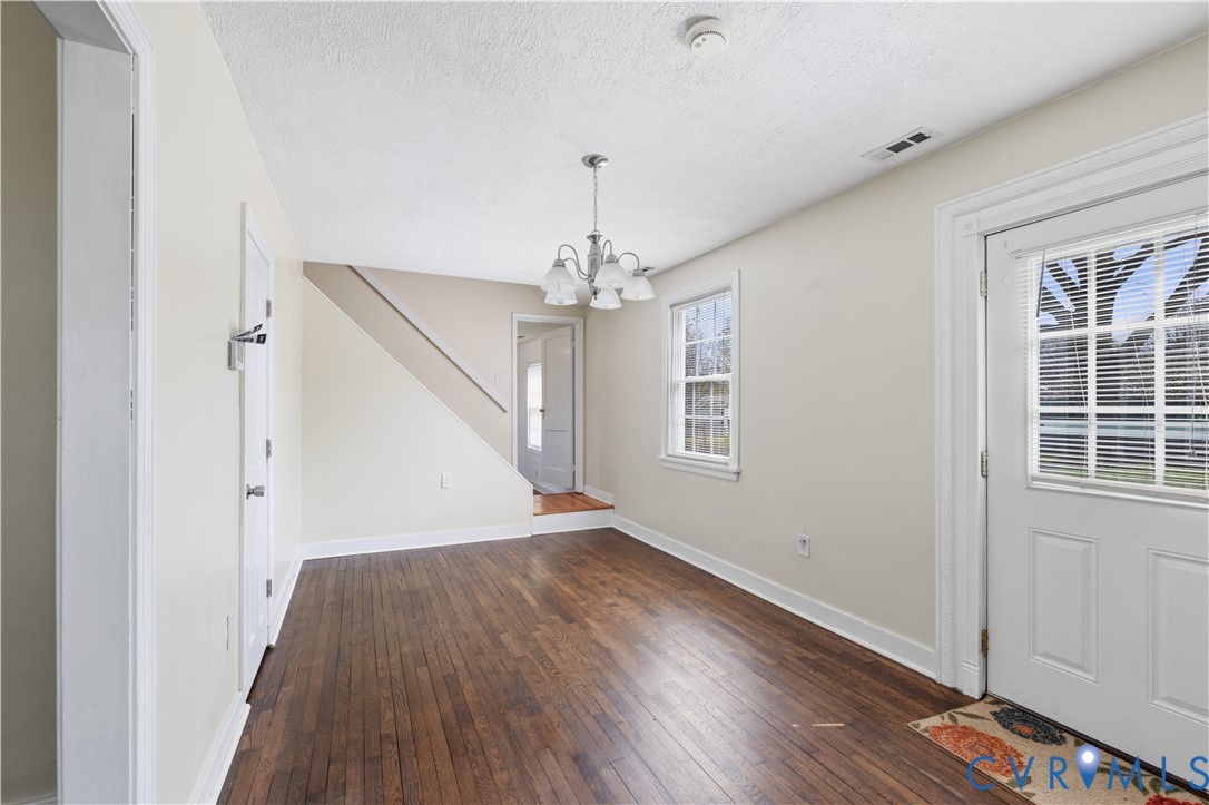 2809 Brampton Way North Chesterfield, VA 23234 - Photo 8 of 38 wooden floor in an empty room with a window