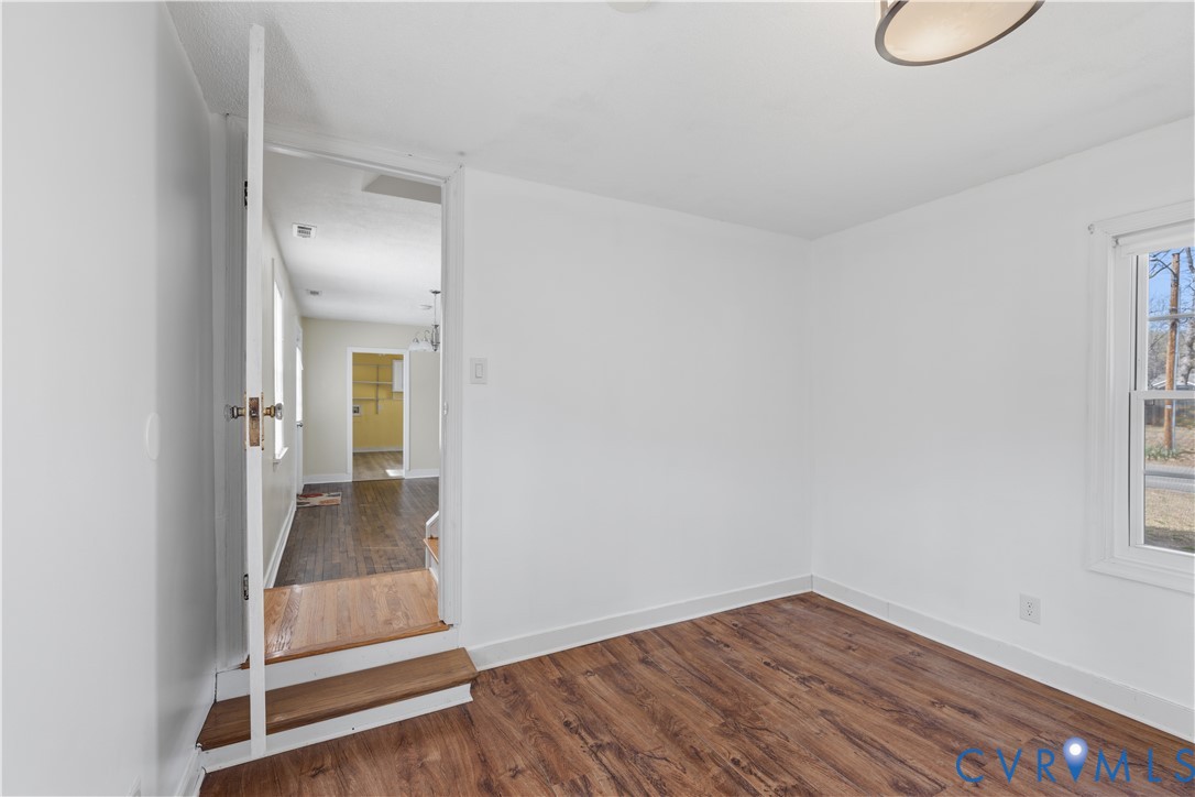 2809 Brampton Way North Chesterfield, VA 23234 - Photo 10 of 38 a view of a room with wooden floor and white walls