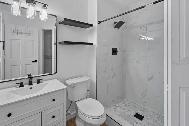 a view of a room with racks on the wall