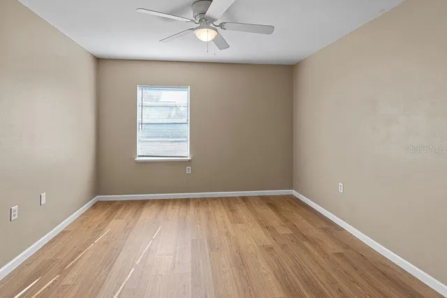 front view of a house with a large window