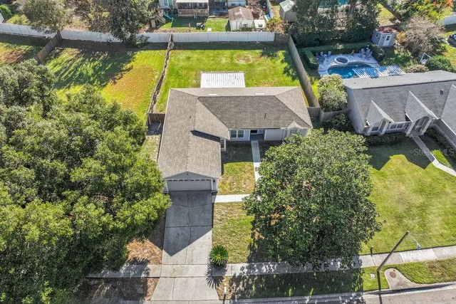 aerial view of a house with swimming pool