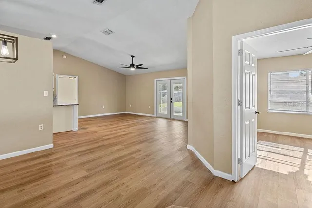a view of a livingroom with wooden floor