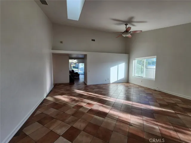 a kitchen with a sink stainless steel appliances and cabinets