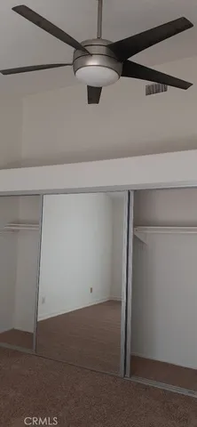 a view of a room that has a window in it