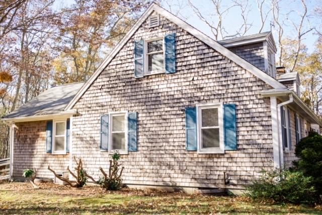 26 Crowell Road Sandwich, MA 02563 - Photo 3 of 14 a view of a house with large windows