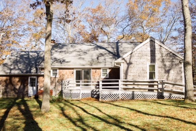 26 Crowell Road Sandwich, MA 02563 - Photo 4 of 14 a view of house with backyard and sitting area