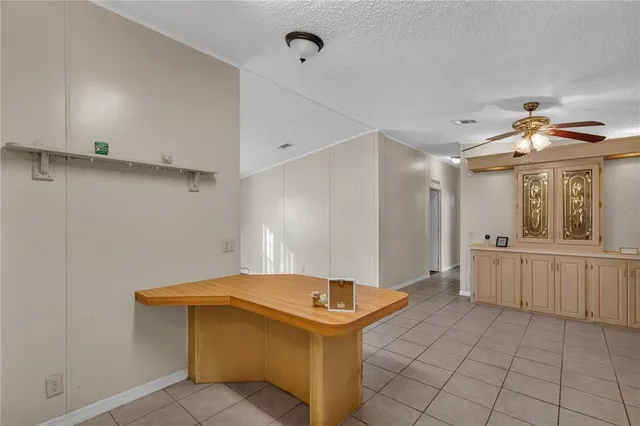 a kitchen with stainless steel appliances granite countertop a sink and a stove