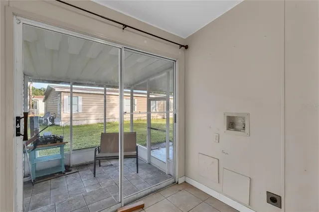 a room with sliding glass door