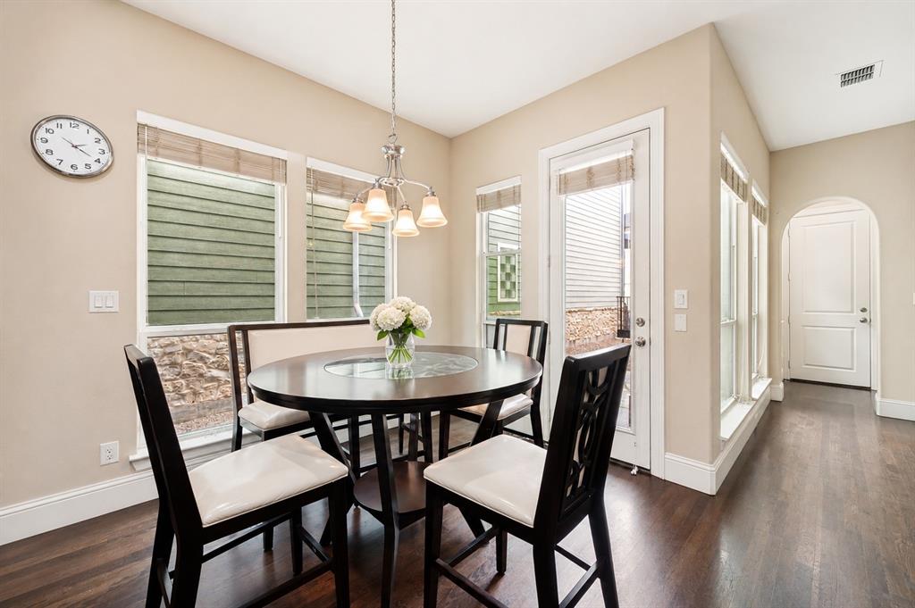 773 South Coppell Road Coppell, TX 75019 - Photo 10 of 30 a view of a dining room with furniture and wooden floor