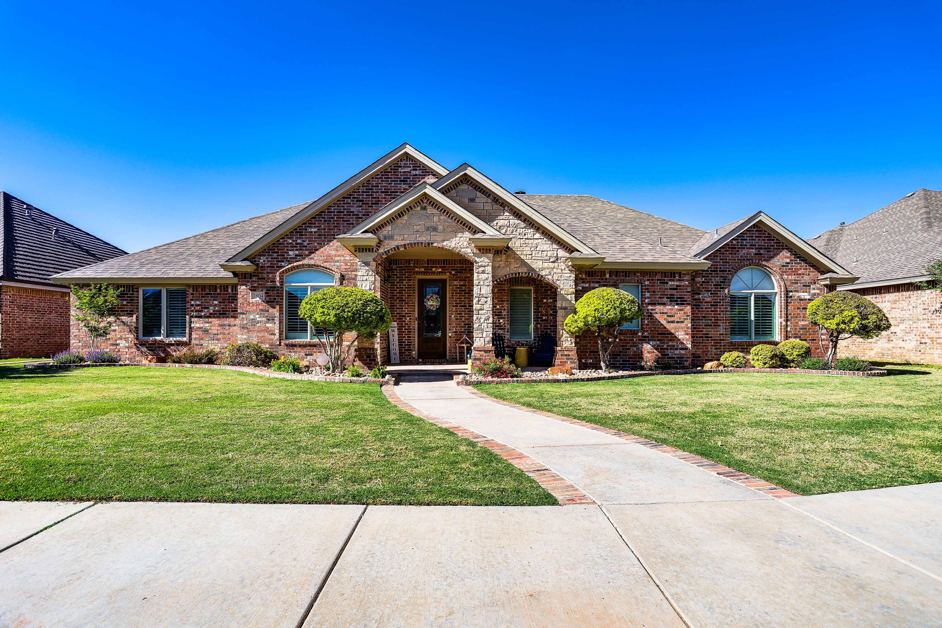 3804 103rd Street Lubbock, TX 79423 - Photo 1 of 32 a view of a house with a yard