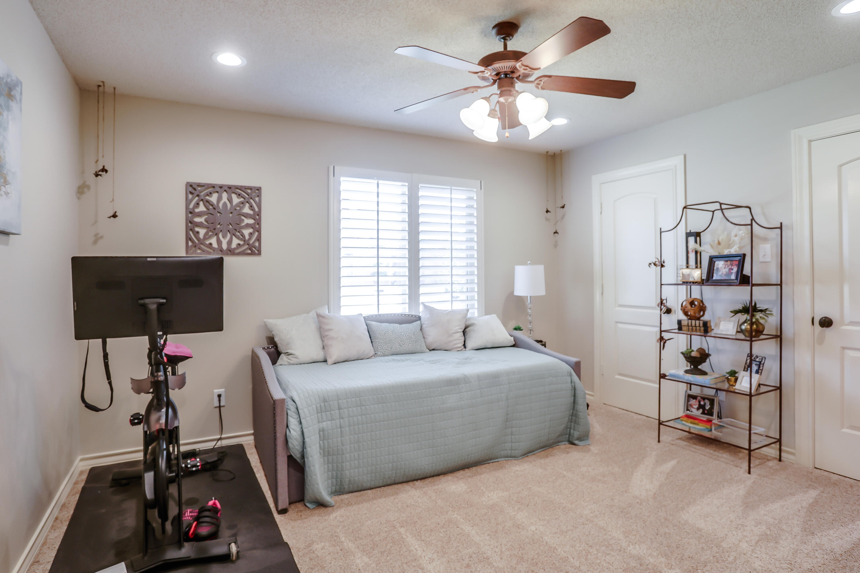 3804 103rd Street Lubbock, TX 79423 - Photo 20 of 32 a bedroom with a bed furniture and a window