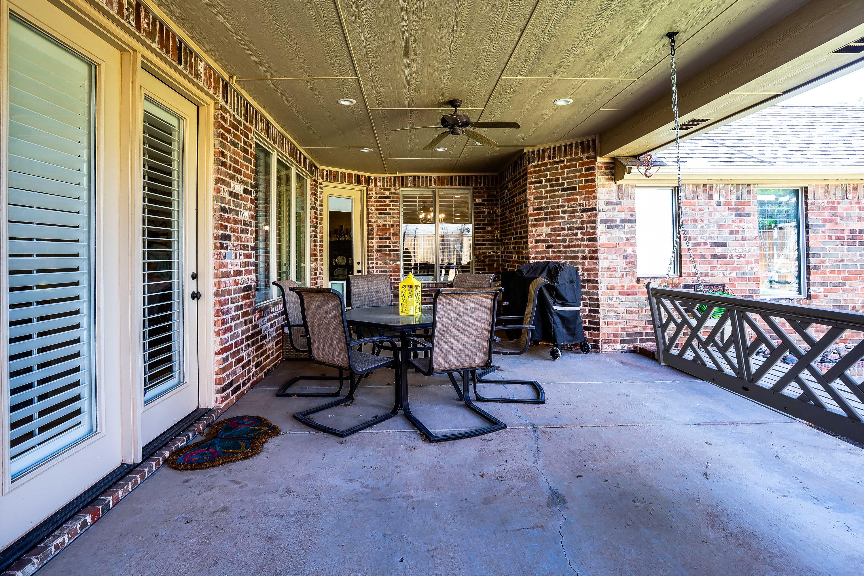 3804 103rd Street Lubbock, TX 79423 - Photo 30 of 32 a view of a room with furniture and a window