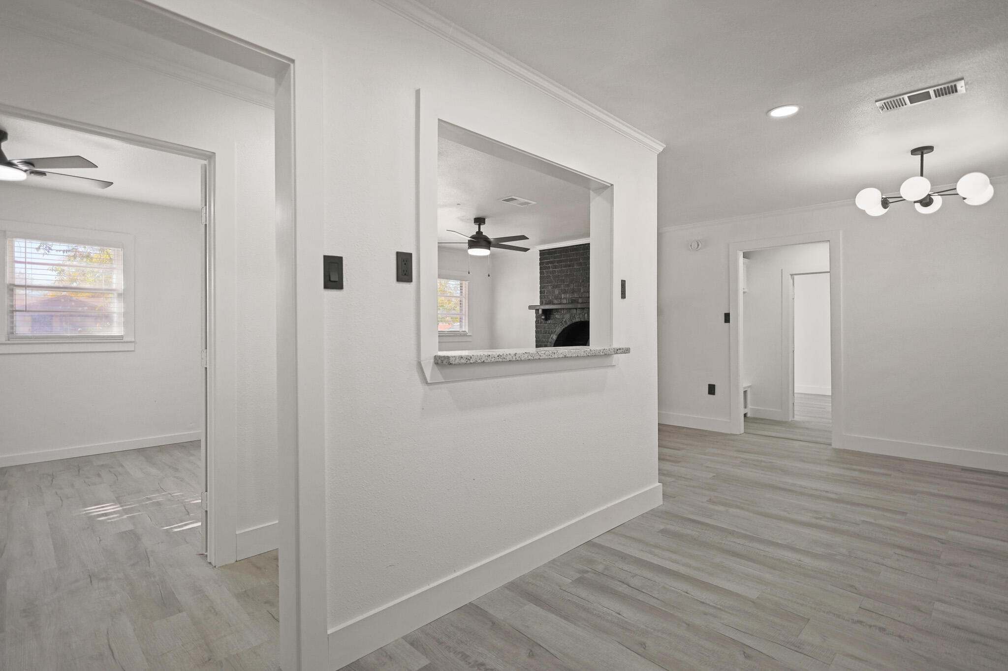 5512 45th Street Lubbock, TX 79414 - Photo 12 of 30 wooden floor in an empty room