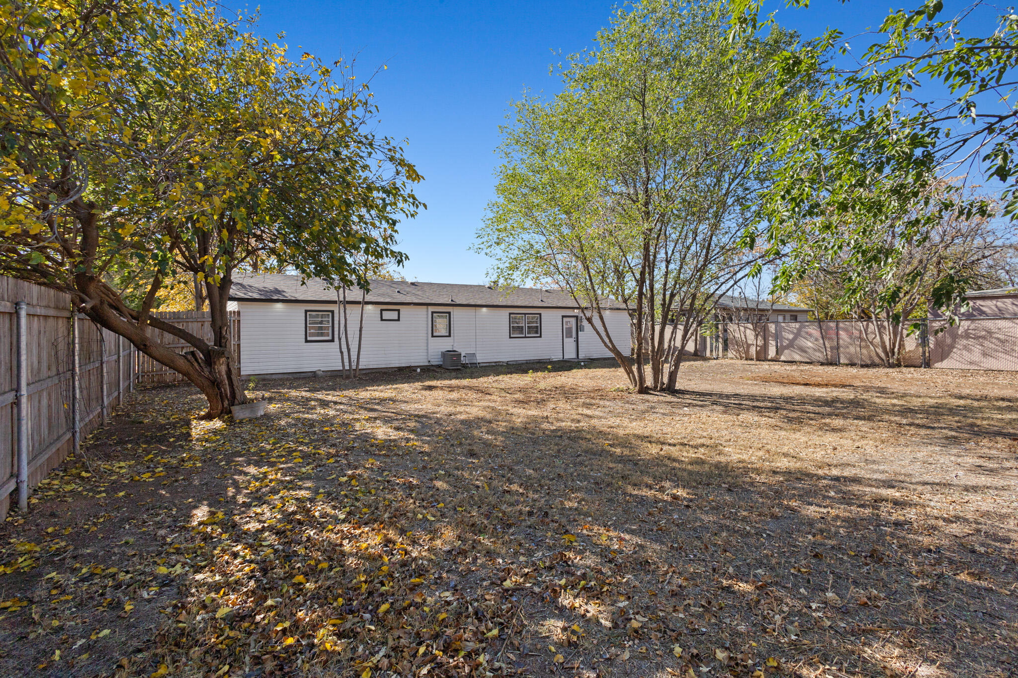5512 45th Street Lubbock, TX 79414 - Photo 30 of 30 a house that has a tree in front of it