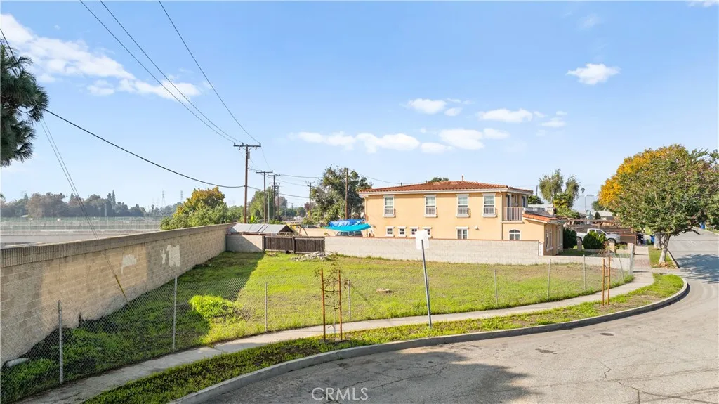 0 Nevada South Gate, CA 90280 - Photo 2 of 10 a view of a swimming pool with a lake view