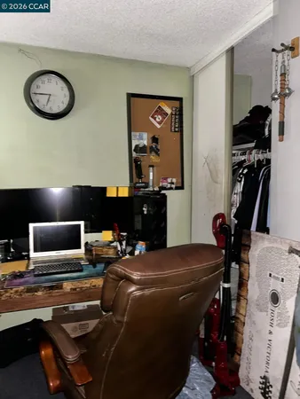 a room with furniture and gym equipment