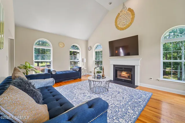 a kitchen with a stove a sink and a microwave