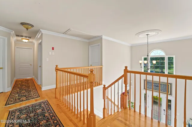 a bathroom with a tub a sink and a shower