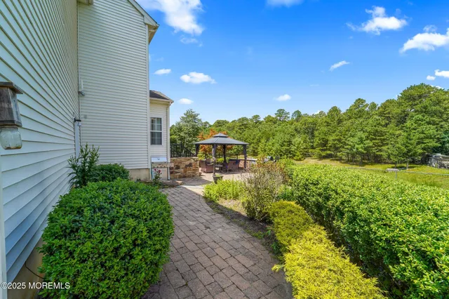 a view of a trees and basketball court