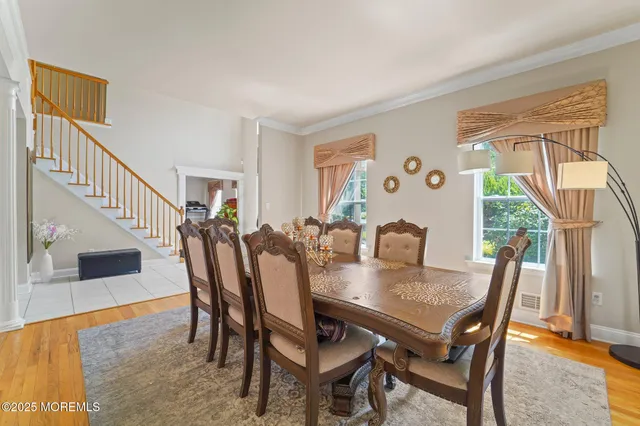 a living room with furniture rug and window