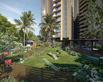 a view of a backyard with plants and outdoor seating