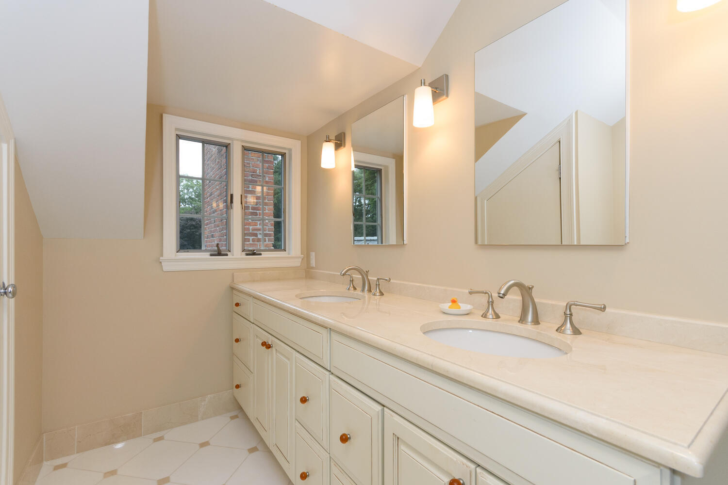 10 Highview Road Darien, CT 06820 - Photo 26 of 42 a bathroom with a sink and a mirror