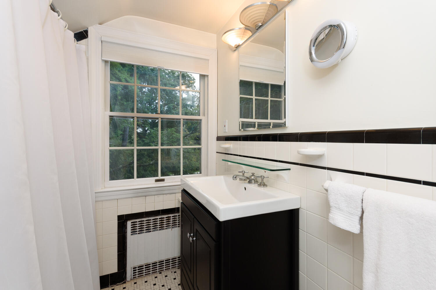 10 Highview Road Darien, CT 06820 - Photo 31 of 42 a kitchen with a sink a stove and a microwave oven