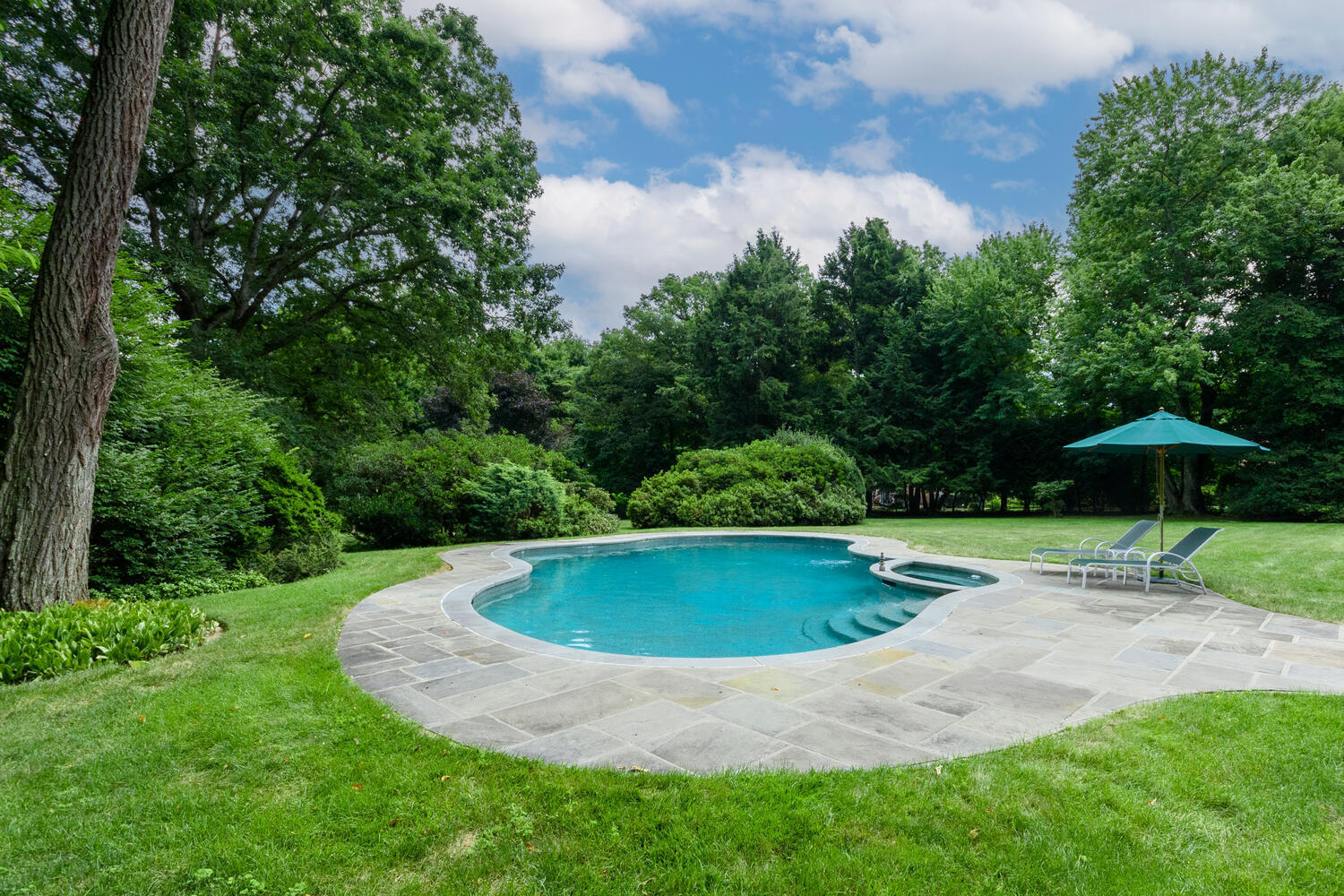 10 Highview Road Darien, CT 06820 - Photo 33 of 42 a view of a swimming pool with a yard