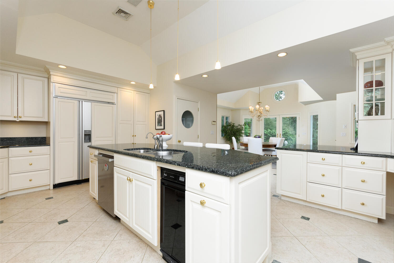 10 Highview Road Darien, CT 06820 - Photo 9 of 42 a kitchen with granite countertop white cabinets and white appliances