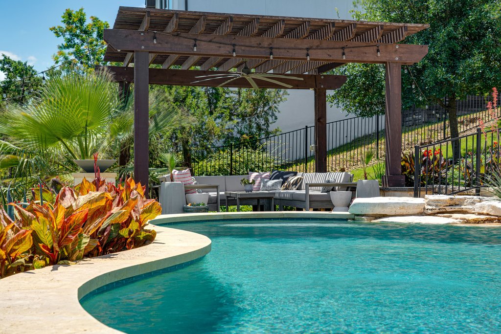 203 Lodestone Lane Austin, TX 78738 - Photo 5 of 40 Pergola with plenty of seating is perfect for entertaining by the pool!