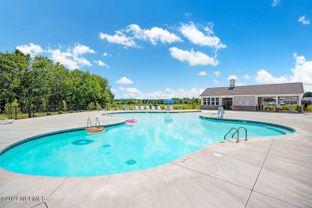 1124 Burled Oak Rdg Loop Southeast, Unit LOT 36 Bolivia, NC 28422 - Photo 20 of 38 Pool and Clubhouse