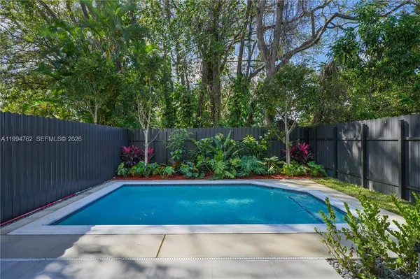 a view of a backyard with a garden