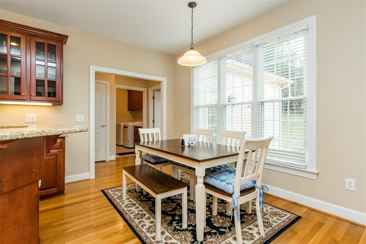 107 Austin Pond Road Clayton, NC 27520 - Photo 10 of 24 Breakfast area overlooking back patio and yard