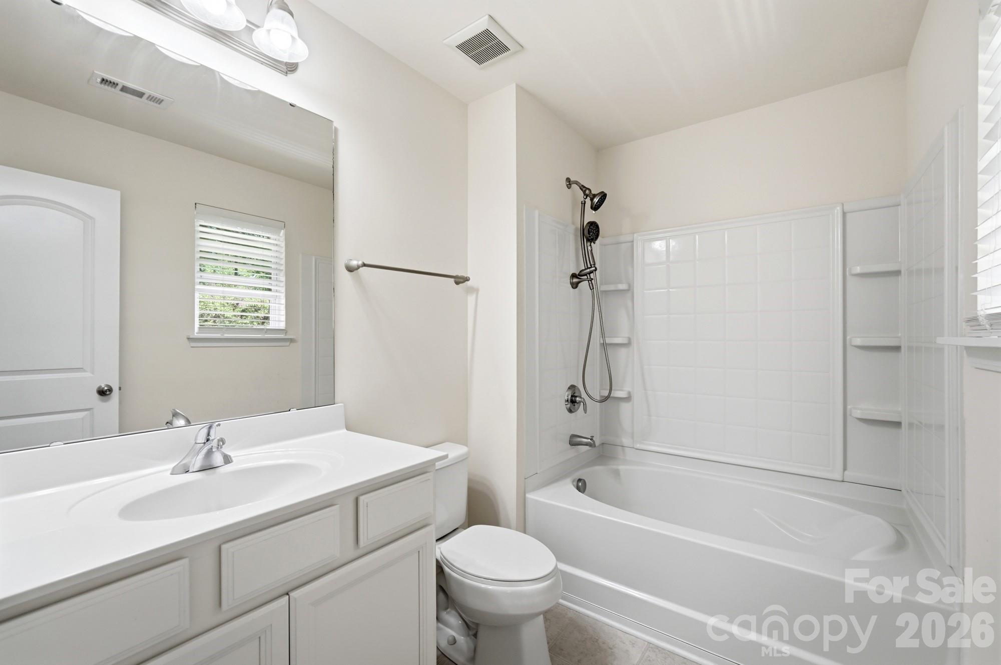 175 Limerick Road, Unit B Mooresville, NC 28115 - Photo 22 of 30 a bathroom with a sink toilet and shower