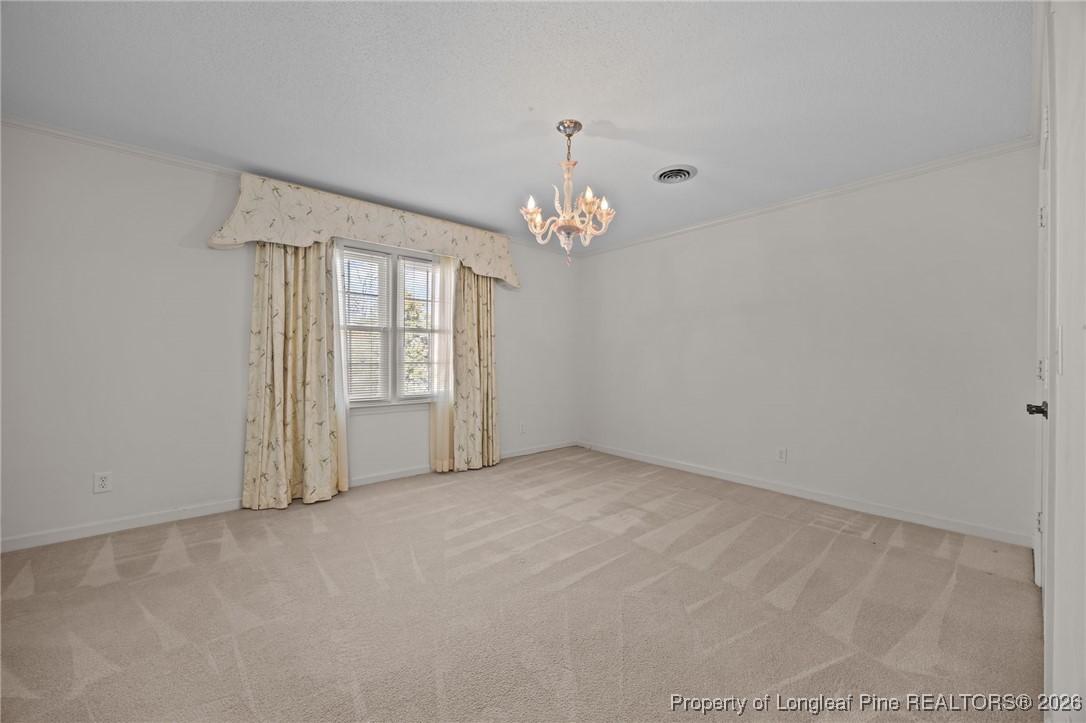 4943 Highway 301 Benson, NC 27504 - Photo 15 of 49 a view of an empty room with a window