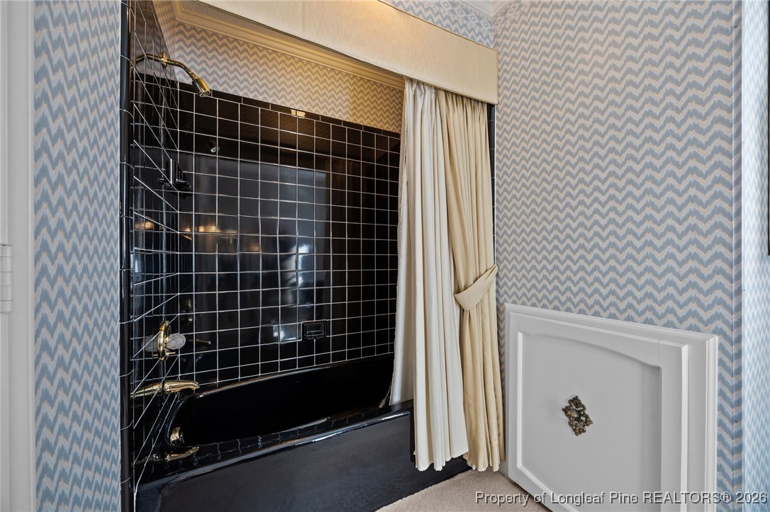 4943 Highway 301 Benson, NC 27504 - Photo 21 of 49 a bathroom with a shower